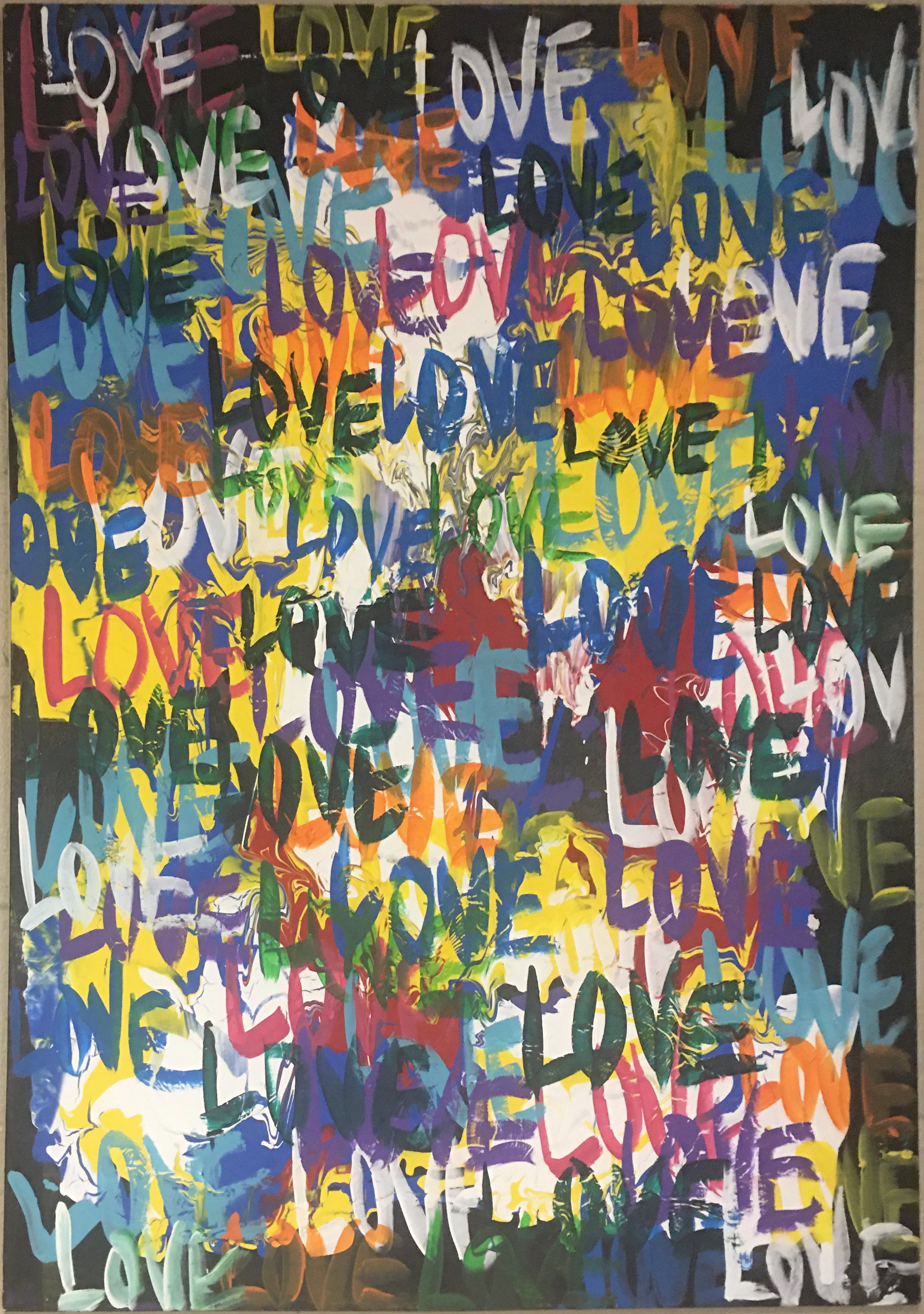 The word LOVE written over and over in every color across a large black canvas.