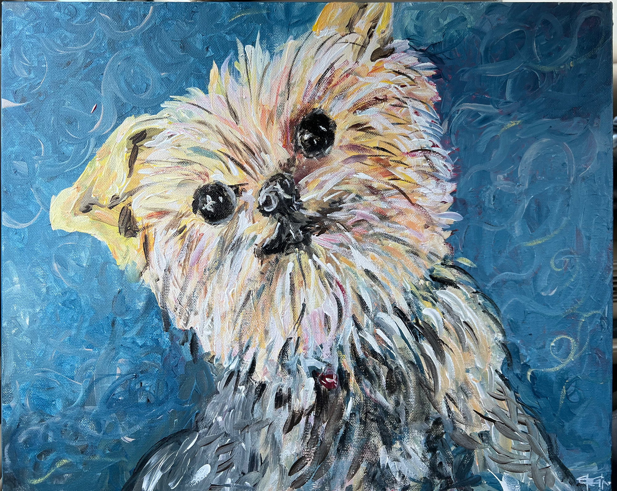 A terrier’s head in cream, ochre and white against a deep blue ground worked in swirls.